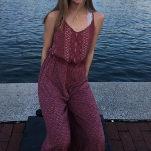 pink patterned jump suit